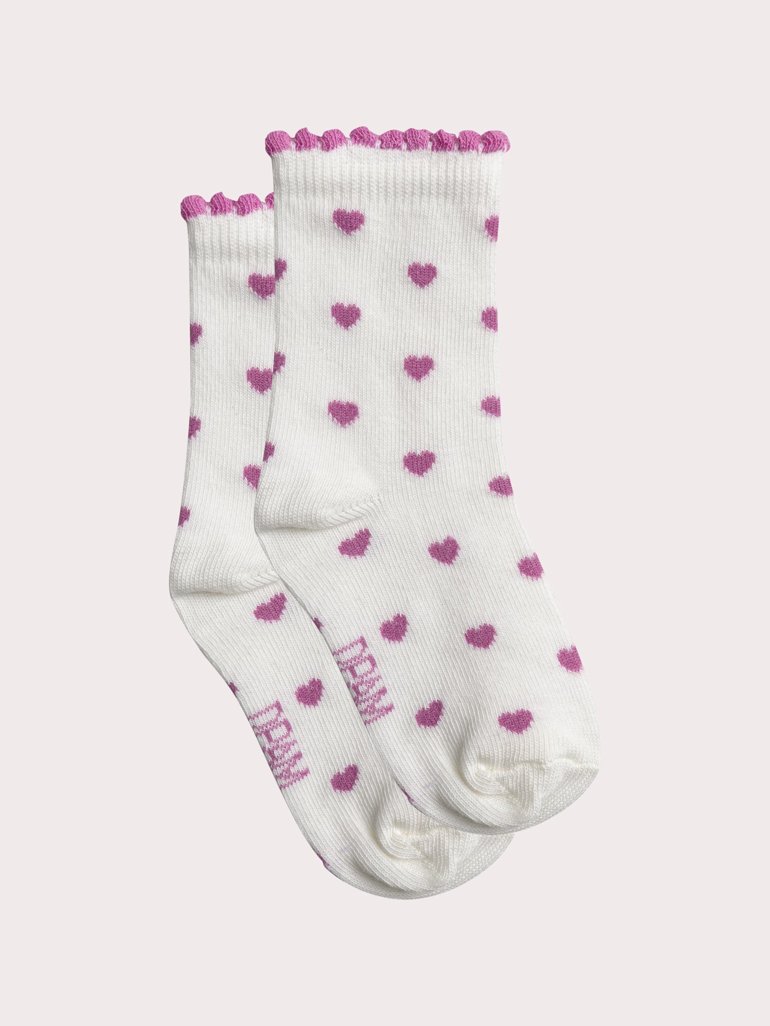 Chaussettes roses à cœurs pour bébé fille